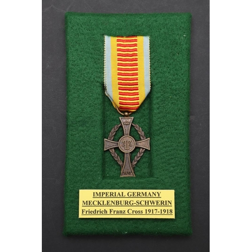 1133 - IMPERIAL GERMANY: A SMALL COLLECTION OF FIRST WORLD WAR AND LATER AWARDS. A Mecklenburgf-Schwerin Fr... 