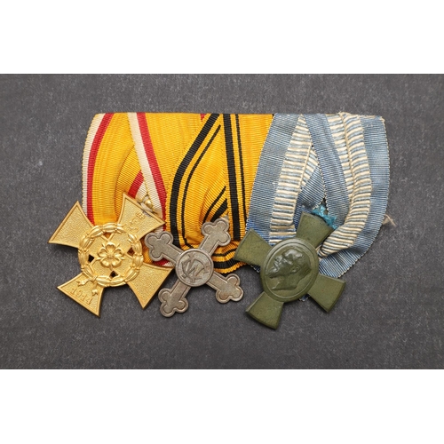 1137 - IMPERIAL GERMANY: A GREAT WAR GROUP OF THREE. A group of three comprising Lippe Detmold War Merit Cr... 