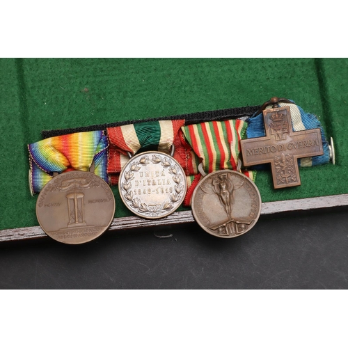 1151 - ITALY: A FIRST WORLD WAR GROUP OF FOUR. A group of four comprising: Italian cross for War Merit, Roy... 