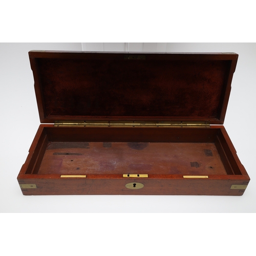 62 - TWO PISTOL BOXES, BOTH WITH VACANT INTERIORS. An oak pistol box, rectangular with a central brass di... 