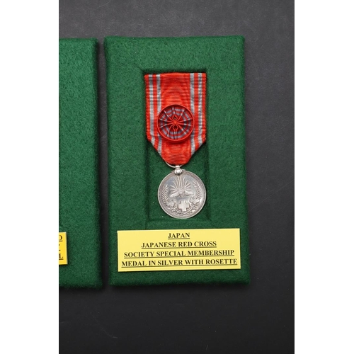 1163 - JAPAN: A COLLECTION OF JAPANESE RED CROSS SOCIETY MEDALS. A Japanese Red Cross Society Life Member M... 