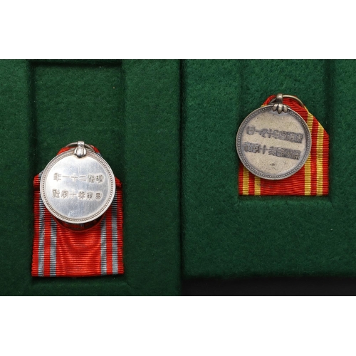 1163 - JAPAN: A COLLECTION OF JAPANESE RED CROSS SOCIETY MEDALS. A Japanese Red Cross Society Life Member M... 