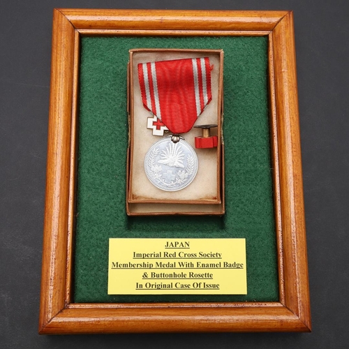 1163 - JAPAN: A COLLECTION OF JAPANESE RED CROSS SOCIETY MEDALS. A Japanese Red Cross Society Life Member M... 