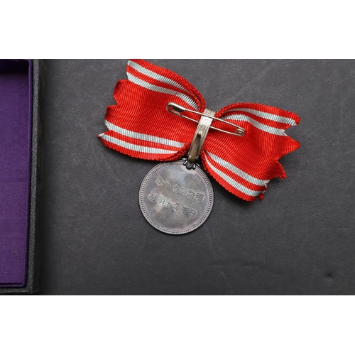 1163 - JAPAN: A COLLECTION OF JAPANESE RED CROSS SOCIETY MEDALS. A Japanese Red Cross Society Life Member M... 