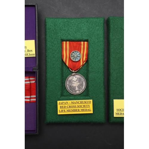 1163 - JAPAN: A COLLECTION OF JAPANESE RED CROSS SOCIETY MEDALS. A Japanese Red Cross Society Life Member M... 