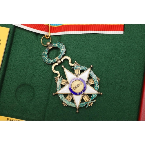 1168 - PARAGUAY: NATIONAL ORDER OF MERIT, COMMANDERS NECK BADGE. The National Order of Merit, in gilt metal... 