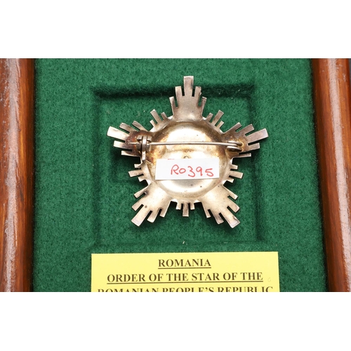 1174 - ROMANIA: THE MEDAL FOR BRAVERY AND LOYALTY 1914-18 AND THREE OTHER AWARDS. The Romanian medal for Br... 