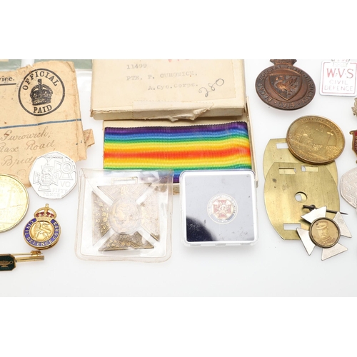 1203 - A COLLECTION OF MILITARIA AND LITERATURE TO INCLUDE BADGES AND BUTTONS. A collection of items includ... 