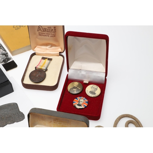 1203 - A COLLECTION OF MILITARIA AND LITERATURE TO INCLUDE BADGES AND BUTTONS. A collection of items includ... 