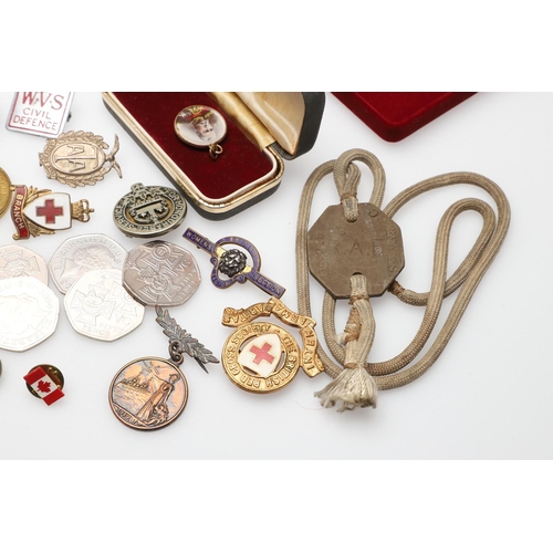 1203 - A COLLECTION OF MILITARIA AND LITERATURE TO INCLUDE BADGES AND BUTTONS. A collection of items includ... 