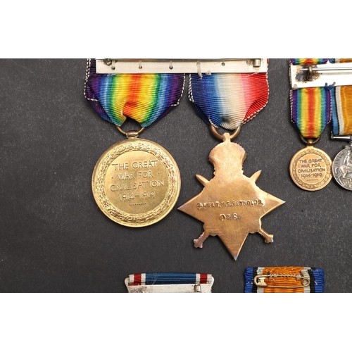 1224 - A FIRST WORLD WAR TRIO TO A MILITARY CROSS RECIPIENT WITH THE HAMPSHIRE REGIMENT. A Great War Trio c... 