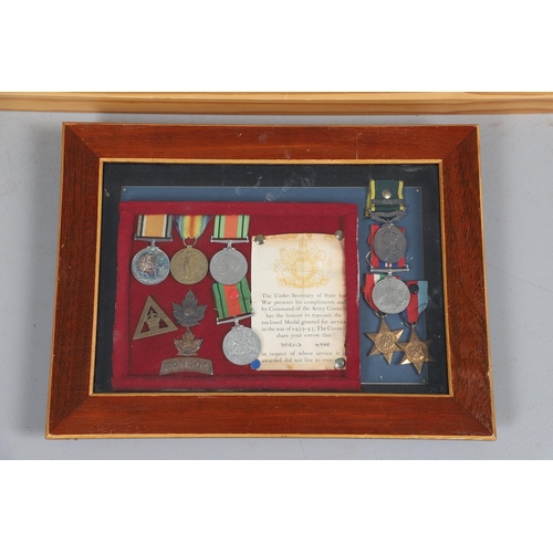 1232 - A COLLECTION OF FIRST AND SECOND WORLD WAR MEDALS TO THE WAKE FAMILY. A collection of medals, badges... 