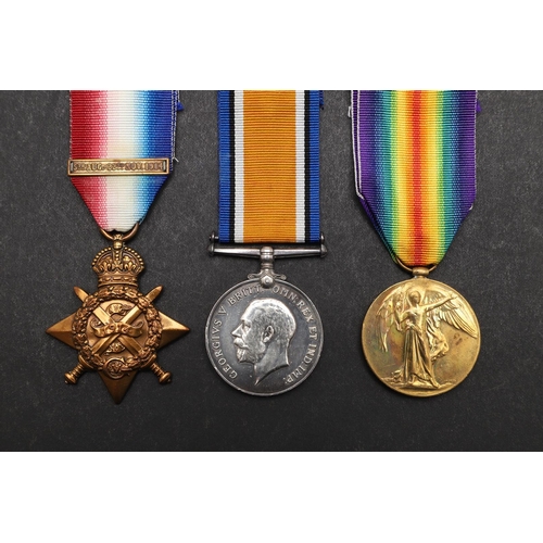 1244 - A FIRST WORLD WAR TRIO TO THE ROYAL FIELD ARTILLERY. A Great War Trio comprising 1914 Star with clas... 