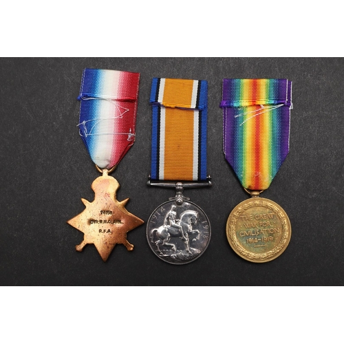 1244 - A FIRST WORLD WAR TRIO TO THE ROYAL FIELD ARTILLERY. A Great War Trio comprising 1914 Star with clas... 