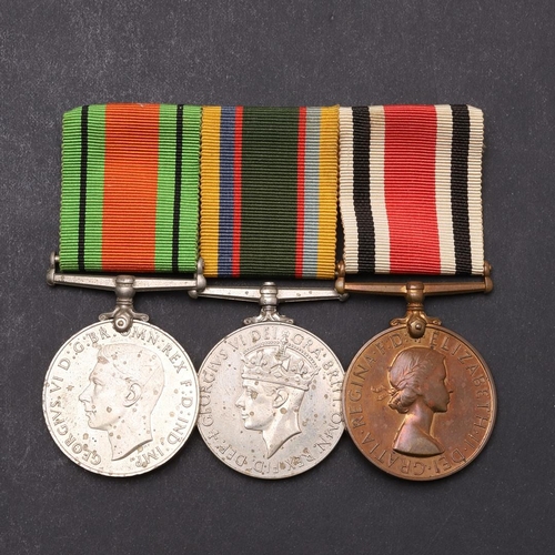 1297 - A SECOND WORLD WAR AND LATER GROUP OF THREE INCLUDING A GEORGE VI CADET FORCE MEDAL. A group of thre... 