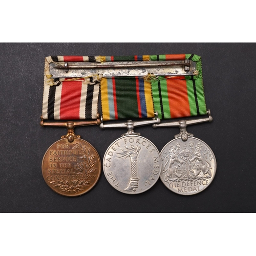 1297 - A SECOND WORLD WAR AND LATER GROUP OF THREE INCLUDING A GEORGE VI CADET FORCE MEDAL. A group of thre... 