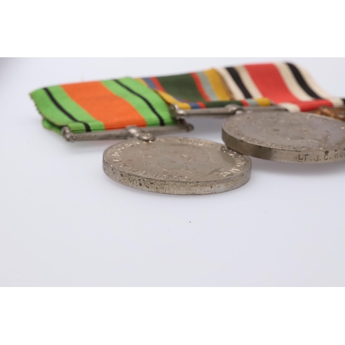 1297 - A SECOND WORLD WAR AND LATER GROUP OF THREE INCLUDING A GEORGE VI CADET FORCE MEDAL. A group of thre... 