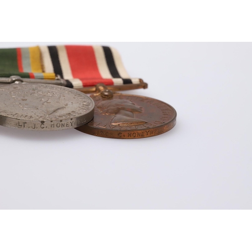 1297 - A SECOND WORLD WAR AND LATER GROUP OF THREE INCLUDING A GEORGE VI CADET FORCE MEDAL. A group of thre... 