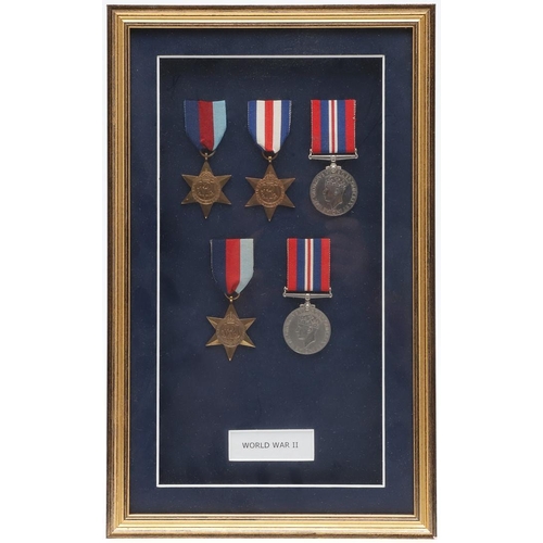 1302 - A FRAMED COLLECTION OF SECOND WORLD WAR MEDALS. A collection of medals comprising 1939-45 Stars (2) ... 