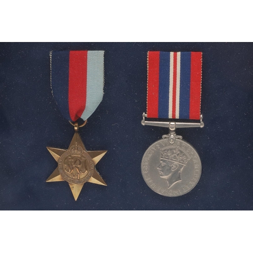 1302 - A FRAMED COLLECTION OF SECOND WORLD WAR MEDALS. A collection of medals comprising 1939-45 Stars (2) ... 