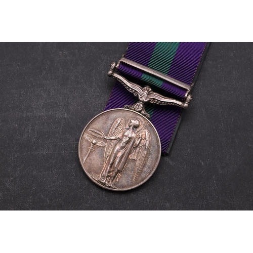 1321 - AN ELIZABETH II GENERAL SERVICE MEDAL 1918 - 1962 WITH ARABIAN PENINSULA CLASP TO THE TRUCIAL OMAN S... 