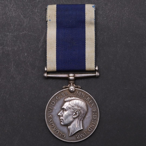 1348 - A GEORGE VI ROYAL NAVAL LONG SERVICE AND GOOD CONDUCT MEDAL. A George VI Royal Navy Long Service and... 