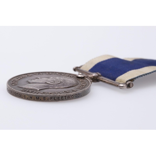 1348 - A GEORGE VI ROYAL NAVAL LONG SERVICE AND GOOD CONDUCT MEDAL. A George VI Royal Navy Long Service and... 