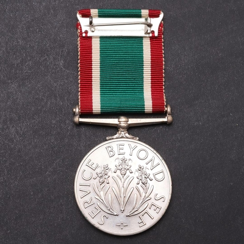 1352 - A WOMEN'S VOLUNTARY SERVICE MEDAL. A Women's Voluntary Service Medal, unnamed as issued, on ribbon w... 