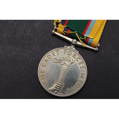 1353 - AN ELIZABETH II CADET FORCES MEDAL. An Elizabeth II Cadet Forces medal named to Major A.G. Willford.... 