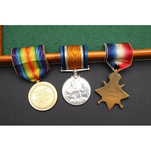 807 - A FIRST WORLD WAR TRIO AND MEMORIAL PLAQUE TO A CASUALTY AT CORONEL. A Great War trio comprising 191... 