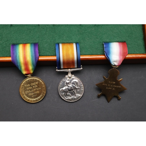 852 - A FIRST WORLD WAR TRIO TO THE SUFFOLK REGIMENT. A Trio comprising 1914-15 Star named to 19236 Pte E.... 