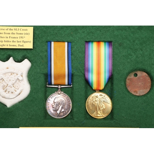 862 - A FIRST WORLD WAR PAIR AND TRENCH ART SOUVENIR TO THE SOMERSET LIGHT INFANTRY. A Great War pair comp... 