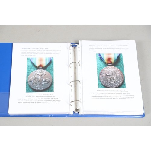 900 - AN EXTENSIVE COLLECTION OF FIRST WORLD WAR INTER-ALLIED VICTORY MEDALS. A collection of first World ... 