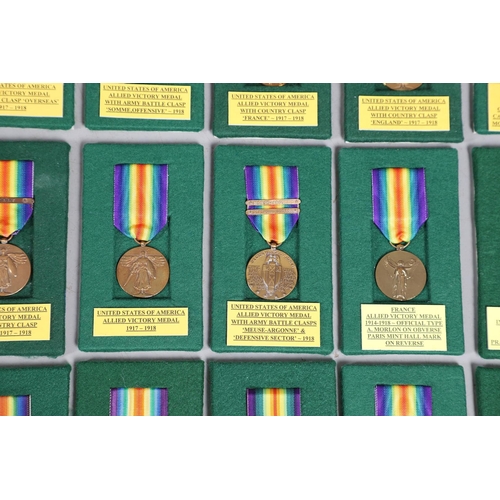 900 - AN EXTENSIVE COLLECTION OF FIRST WORLD WAR INTER-ALLIED VICTORY MEDALS. A collection of first World ... 