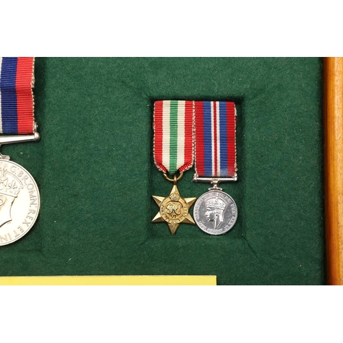 943 - TWO SECOND WORLD WAR MEDALS TO MISS BURBECK, ROME. A pair comprising Italy Star and War Medal, unnam... 