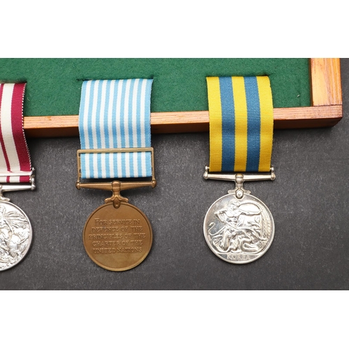 945 - A KOREA AND NEAR EAST GROUP OF FOUR TO THE ROYAL NAVY. A group of four comprising Korean War Medal 1... 