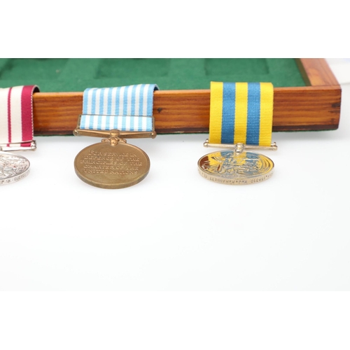 945 - A KOREA AND NEAR EAST GROUP OF FOUR TO THE ROYAL NAVY. A group of four comprising Korean War Medal 1... 