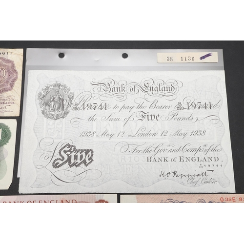 1420 - A BANK OF ENGLAND FIVE POUND NOTE, 1938. A Bank of England Kenneth O. Peppiatt £5 note, 12th May 193... 