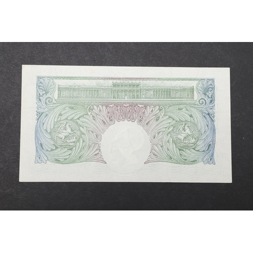 1424 - A BANK OF ENGLAND SERIES 'A' ONE POUND NOTE. A Series 'A' Britannia Issue one pound banknote number ... 