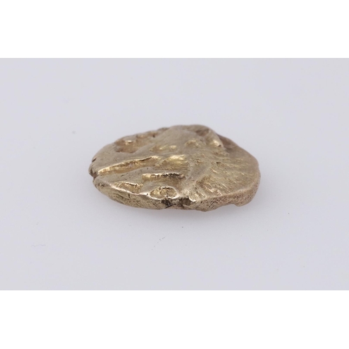 1428 - BRITISH IRON AGE: A BELGAE GOLD QUARTER STATER. A gold quarter stater, possibly stylised boat with t... 