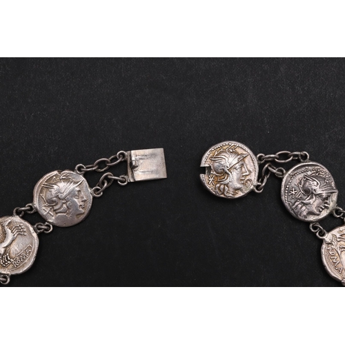 1435 - A NECKLACE AND PAIR OF EARINGS FORMED FROM EIGHTEEN PRE-IMPERIAL SILVER DENARIUS. A necklace formed ... 