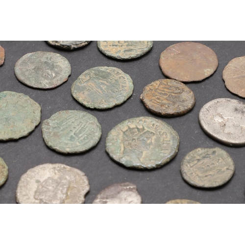 1448 - A COLLECTION OF TWENTY FOUR ROMAN COINS, METAL DETECTING FINDS. A mixed collection of twenty four Ro... 