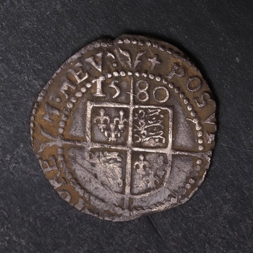 1482 - AN ELIZABETH I THREEPENCE, 1580. A hammered silver threepence, fifth issue with rose and date, mint ... 