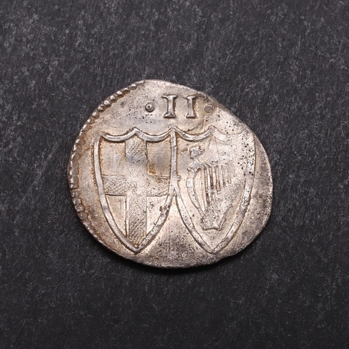 1492 - A COMMONWEALTH HAMMERED SILVER HALFGROAT. A Commonwealth period halfgroat, obverse with shield withi... 