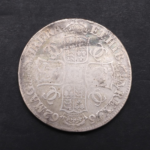 1493 - A CHARLES II CROWN 1662 WITH LATER GRAFFITI. A Charles II Crown, first type with rose beneath the la... 