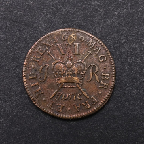 1499 - AN IRISH JAMES II 'GUNMONEY' SIXPENCE, 1689. Laureate and draped bust l. reverse with crown and scep... 