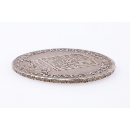 1502 - A WILLIAM AND MARY HALFCROWN, 1690. First busts r. Reverse with second crowned shield, dated 1690. R... 