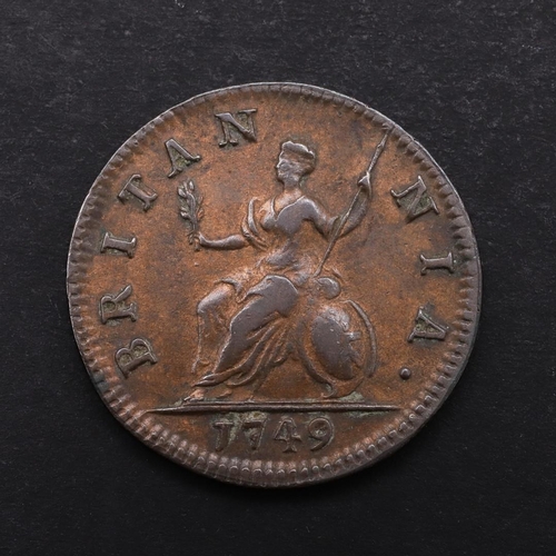 1518 - A GEORGE II FARTHING, 1749. George II, Old laureate and cuirassed bust l. reverse seated figure of B... 