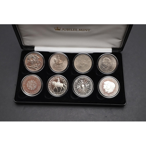 1587 - A JUBILEE MINT CROWN COLLECTION 1951 - 1981. A cased presentation collection of Crowns for 1951, 195... 