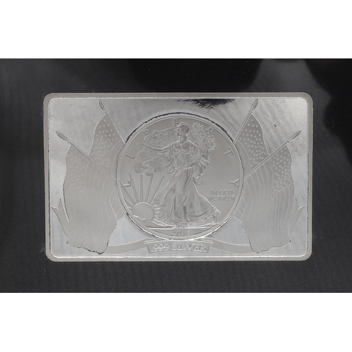 1595 - A SILVER BULLION BRITANNIA BAR, 2017 AND SIMILAR EAGLE BAR 2017. Two Westminster 5 oz silver bullion... 